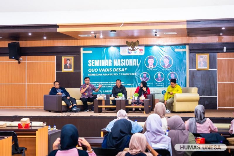 Head of LPPM UNESA (second from left) provided reinforcement at the National Seminar which was attended by participants from Bappeda elements, heads and village officials from various regions.