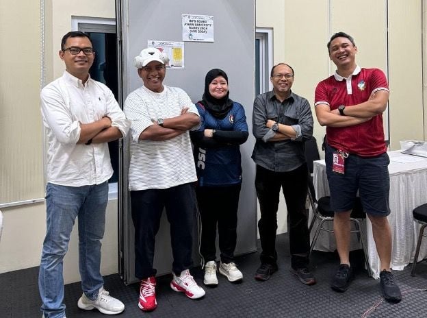 UNESA Chancellor, Prof. Dr. Nurhasan, M.Kes., or Cak Hasan (mixed shoes) monitors preparations for the AUG 2024 opening ceremony at the International Basketball Arena UNESA Campus 2 Lidah Wetan.